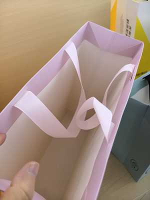 Fully automatically crease-free sheet feeding paper bag making machine